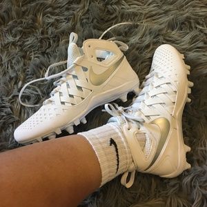 Nike Huarache Girls cleats size 8. .